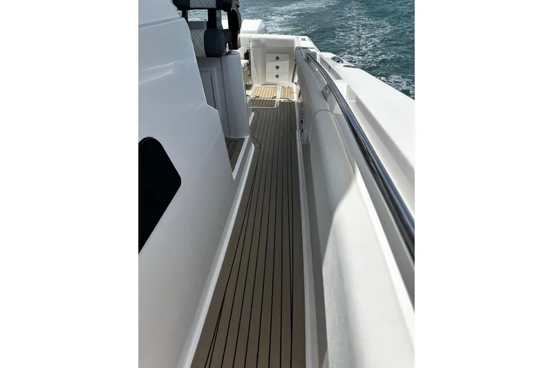  Yacht Photos Pics 2022 Bertram 39 CC boat deck with sleek design and ocean view.