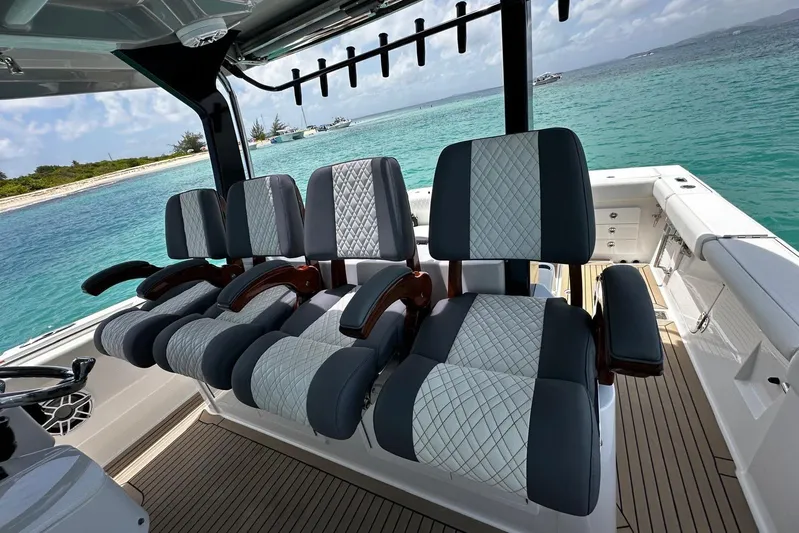  Yacht Photos Pics Luxurious seating on 2022 Bertram 39 CC boat with ocean view.