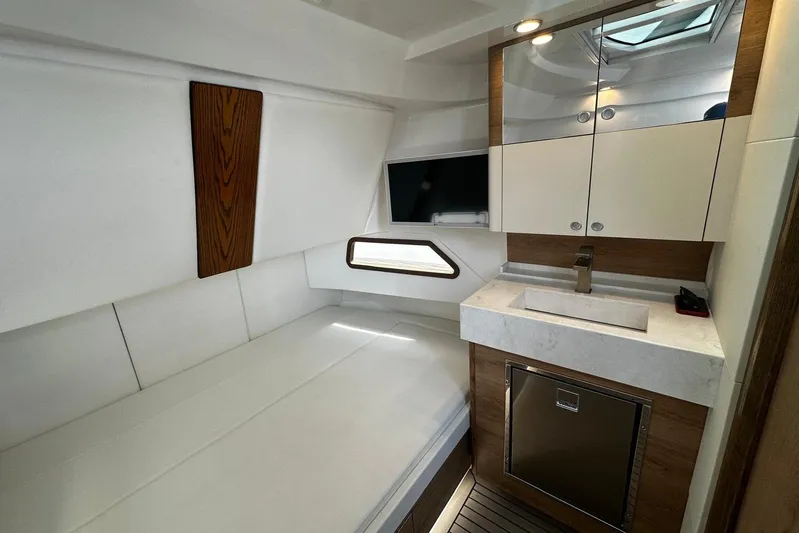 Yacht Photos Pics Interior of 2022 Bertram 39 CC boat featuring modern cabinetry and sleek design.