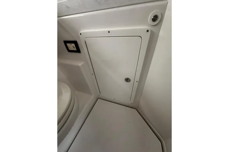  Yacht Photos Pics Interior view of 2022 Bertram 39 CC boat showing a storage compartment.