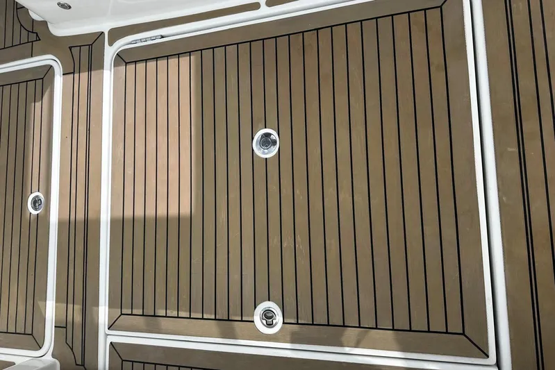  Yacht Photos Pics Teak deck of 2022 Bertram 39 CC boat, featuring sleek design and durable finish.