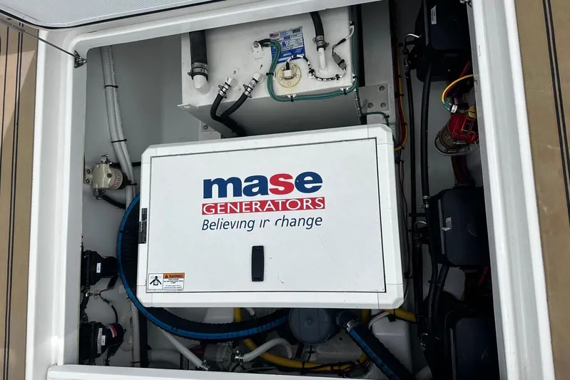  Yacht Photos Pics Engine compartment of 2022 Bertram 39 CC featuring Mase generator.