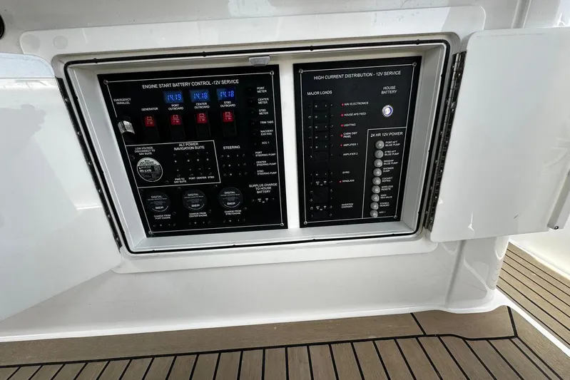  Yacht Photos Pics Control panel on a 2022 Bertram 39 CC boat, featuring battery and power management systems.
