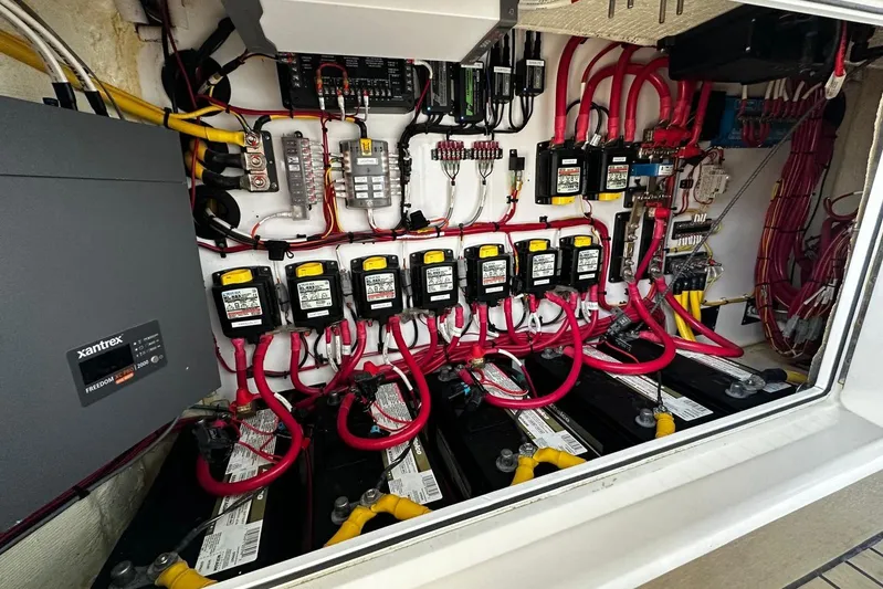  Yacht Photos Pics Electrical system of a 2022 Bertram 39 CC boat with batteries and wiring.