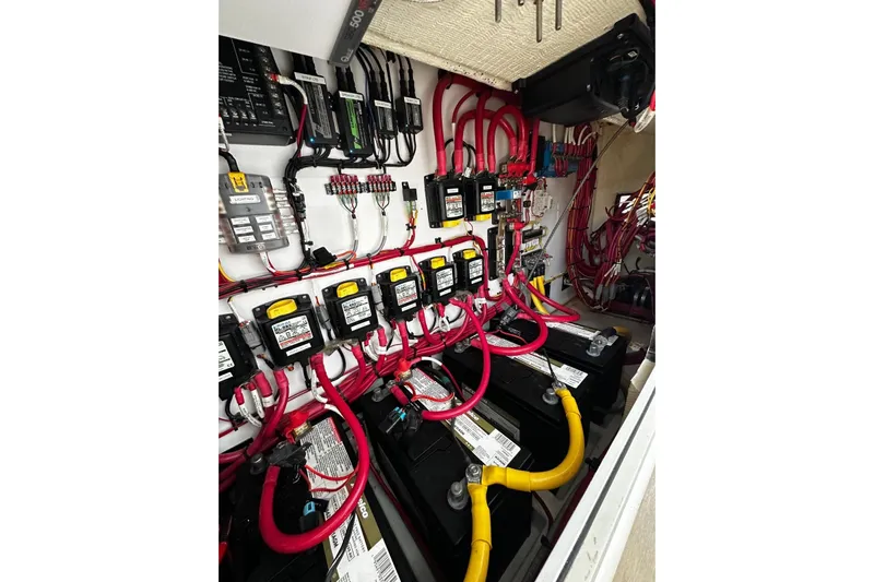  Yacht Photos Pics Electrical system of 2022 Bertram 39 CC boat with batteries and wiring.
