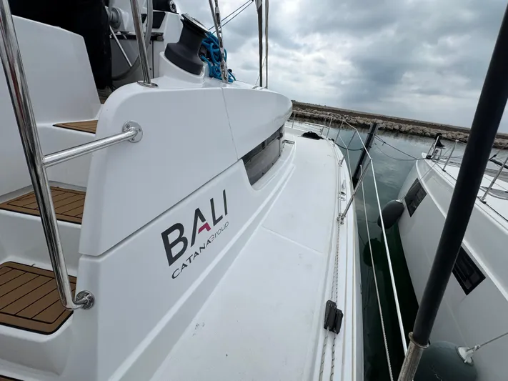  Yacht Photos Pics 2023 Bali 4.2 catamaran docked, featuring sleek design and modern amenities.