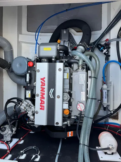  Yacht Photos Pics Engine compartment of a 2023 Bali 4.2 yacht featuring a Yanmar engine.