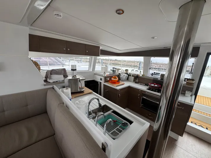  Yacht Photos Pics Modern kitchen interior on 2023 Bali 4.2 yacht, featuring sleek design and appliances.