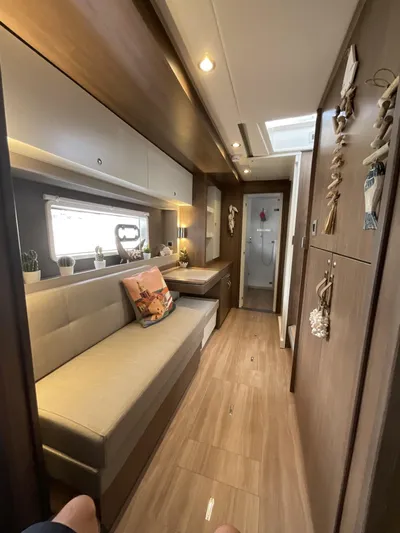  Yacht Photos Pics Modern interior of 2023 Bali 4.2 yacht with cozy seating and elegant decor.
