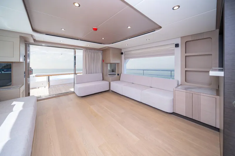  Yacht Photos Pics Luxurious interior of 2024 Nomad 75 SUV yacht with modern design and ocean view.