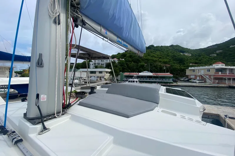 Mirabella Yacht Photos Pics 2022 Bali 4.2 catamaran docked, featuring spacious deck and scenic marina backdrop.