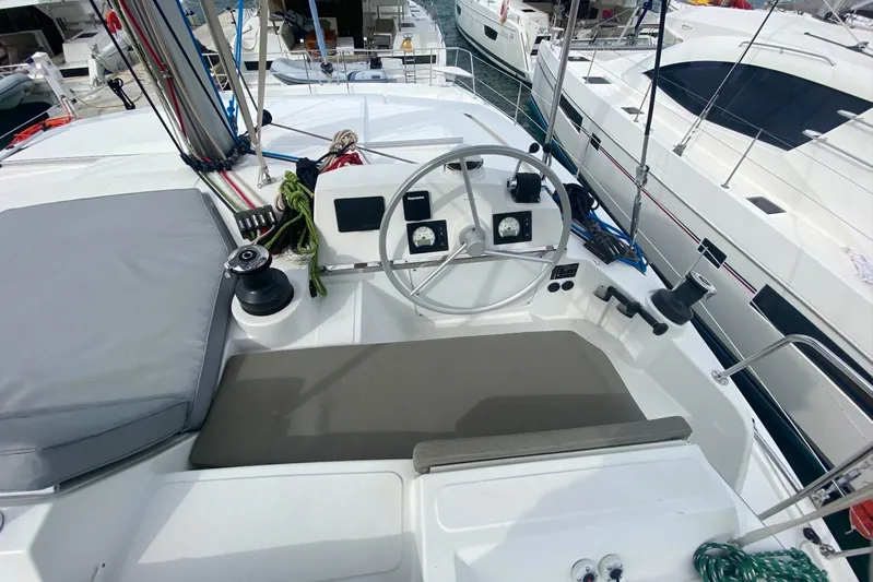 Mirabella Yacht Photos Pics Helm of 2022 Bali 4.2 yacht with steering wheel and navigation instruments.