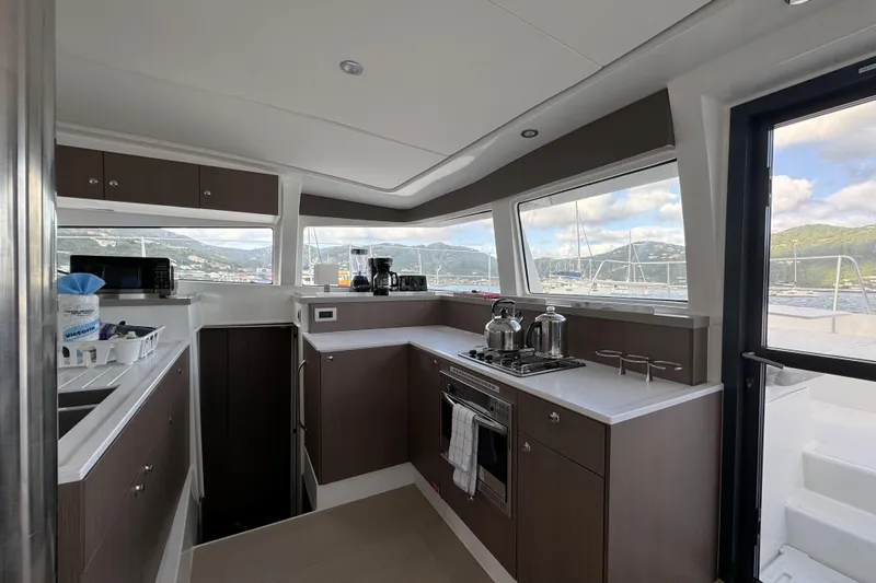 Mirabella Yacht Photos Pics Modern kitchen interior on 2022 Bali 4.2 yacht with scenic marina view.