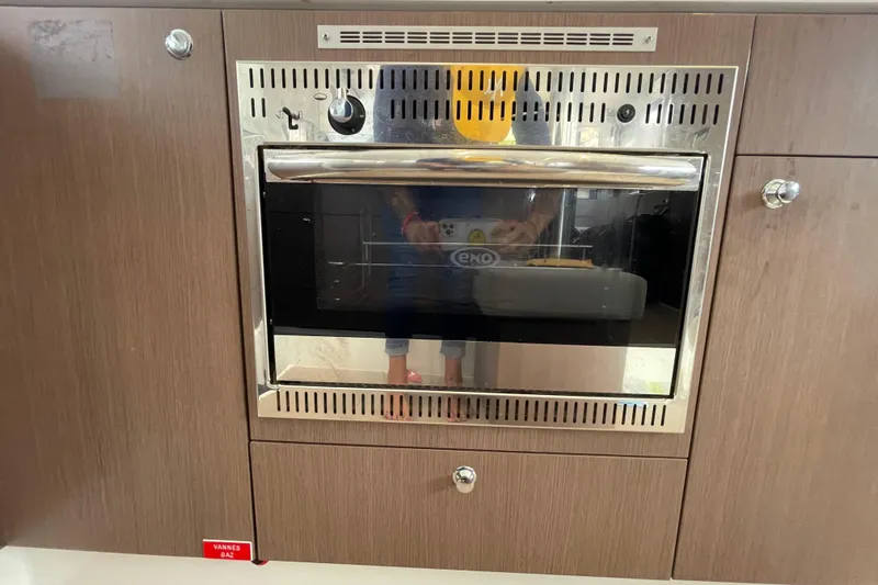 Mirabella Yacht Photos Pics Built-in oven in a Bali 4.2, 2022 model, with wooden cabinetry.