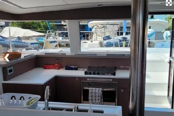 Mirabella Yacht Photos Pics Modern kitchen interior on 2022 Bali 4.2 yacht, featuring sleek countertops and appliances.