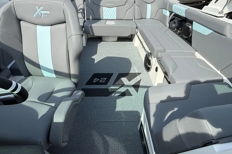 Yacht Photos Pics Interior of 2026 MasterCraft XT24 boat with gray and blue seating.