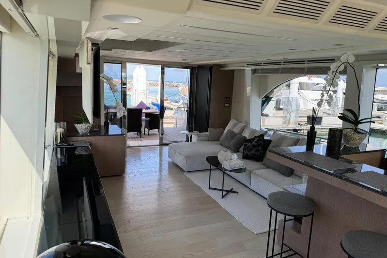  Yacht Photos Pics Luxurious interior of 2019 Monte Carlo Yachts MCY 70 with modern furnishings and sea view.