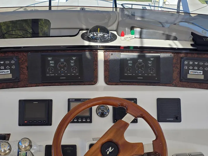  Yacht Photos Pics Control panel of a 2002 Sea Ray 560 Sedan Bridge yacht.