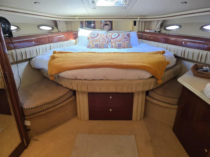  Yacht Photos Pics Luxurious bedroom interior of 2002 Sea Ray 560 Sedan Bridge yacht.