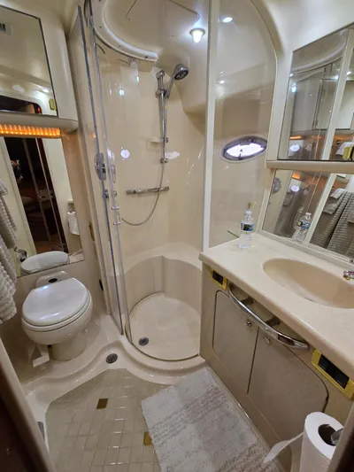  Yacht Photos Pics Luxurious bathroom in 2002 Sea Ray 560 Sedan Bridge yacht with shower and vanity.