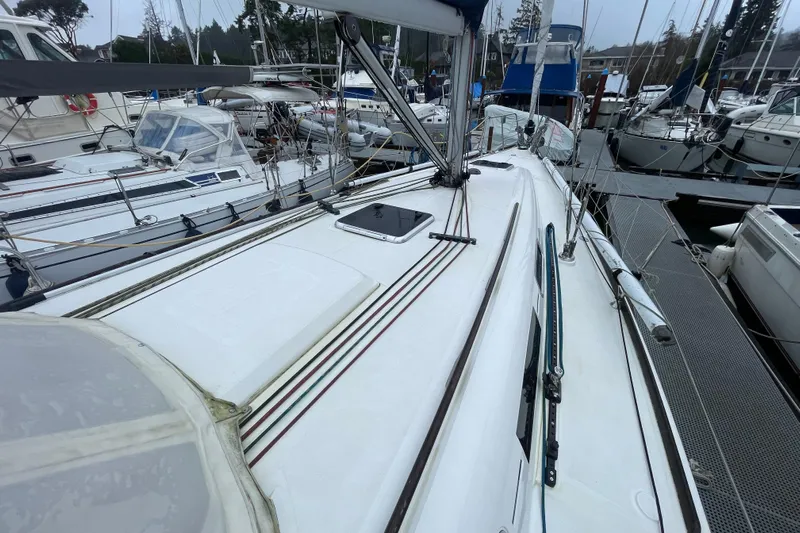 New Journey Yacht Photos Pics 2005 Dufour 40 Performance sailboat docked in a marina, surrounded by other boats.