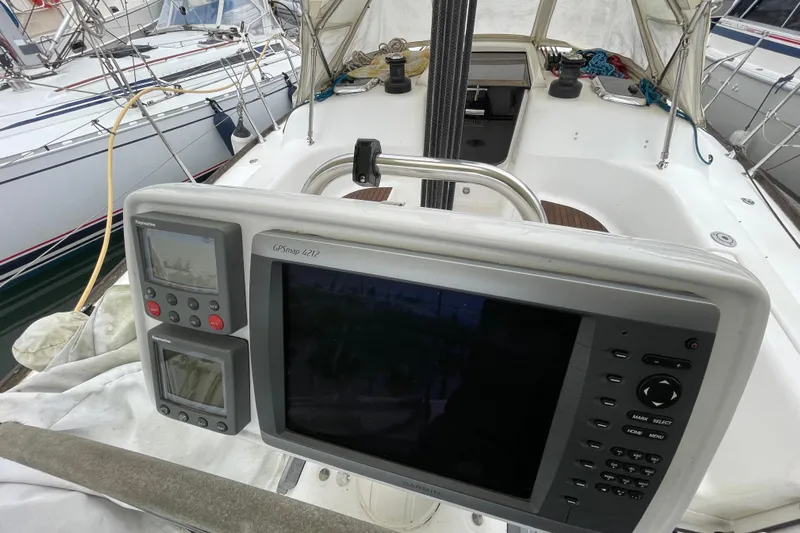 New Journey Yacht Photos Pics Cockpit of 2005 Dufour 40 Performance sailboat with navigation equipment.