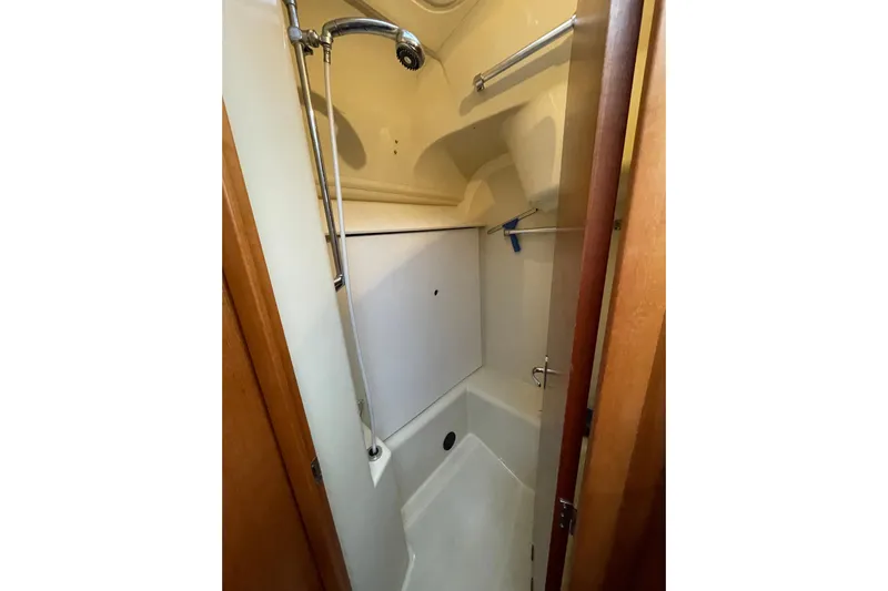 New Journey Yacht Photos Pics 2005 Dufour 40 Performance yacht shower area with chrome fixtures and compact design.