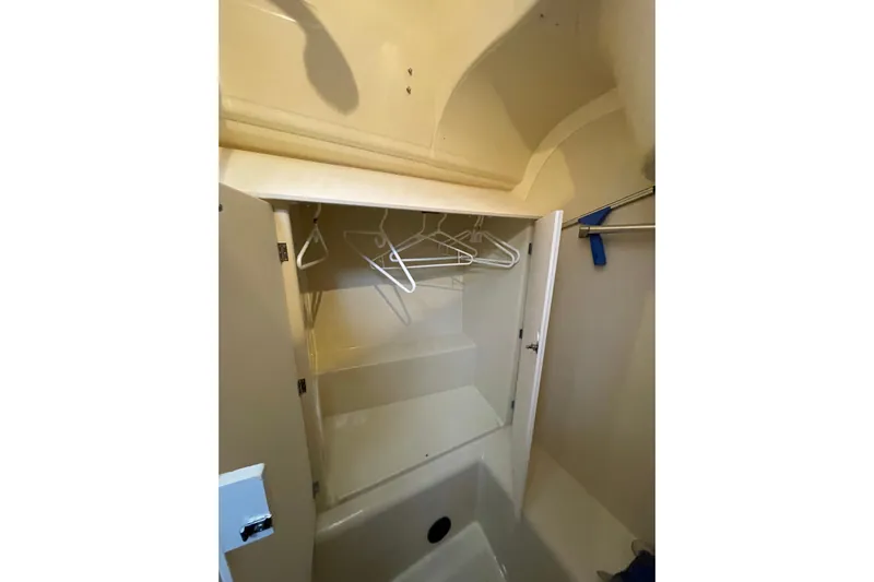 New Journey Yacht Photos Pics Empty closet with hangers inside a 2005 Dufour 40 Performance yacht.