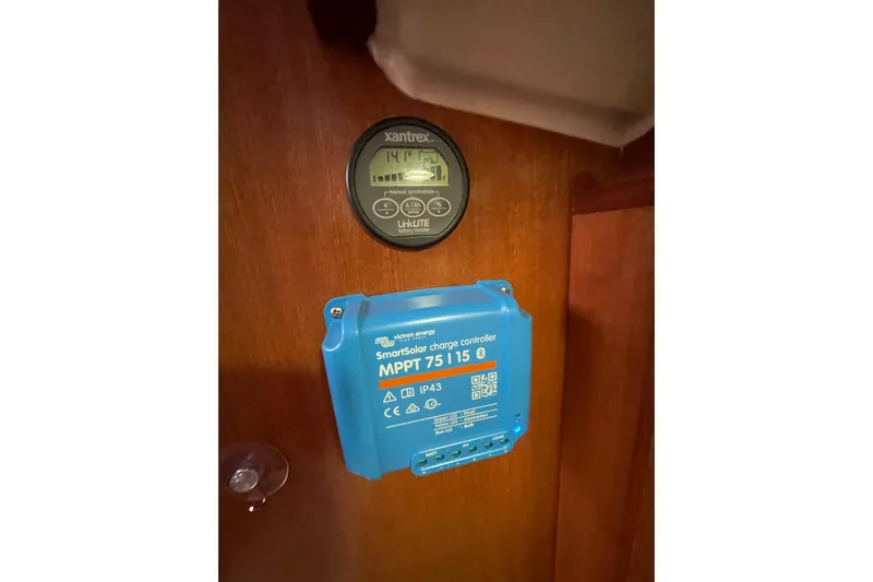 New Journey Yacht Photos Pics Victron SmartSolar charge controller and Xantrex battery monitor on 2005 Dufour 40 Performance yacht.