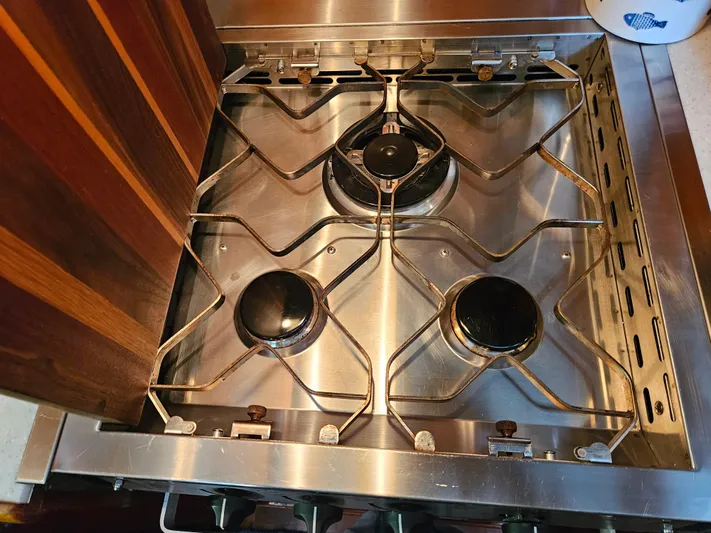 Kolea Yacht Photos Pics Stainless steel stove with three burners on 1983 Ocean Alexander 43 yacht.