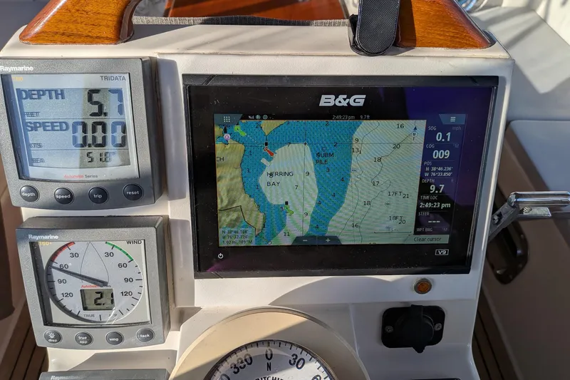  Yacht Photos Pics Navigation instruments on a 2003 Gozzard 37 sailboat, displaying depth, speed, and map.
