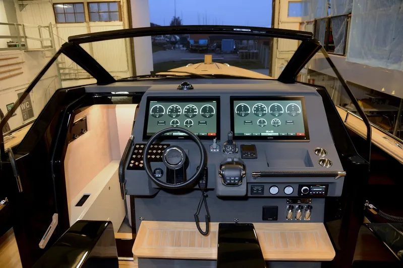 Windy Sr52 Yacht Photos Pics Cockpit of 2021 Windy SR52 yacht with dual digital displays and modern controls.