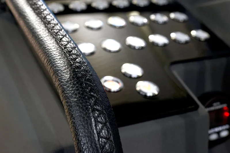 Windy Sr52 Yacht Photos Pics Close-up of Windy SR52 2021 dashboard with leather detail and control buttons.