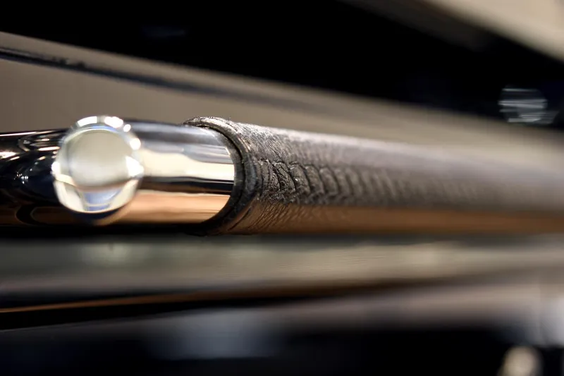 Windy Sr52 Yacht Photos Pics Close-up of a polished metal handle with leather grip on a 2021 Windy SR52.