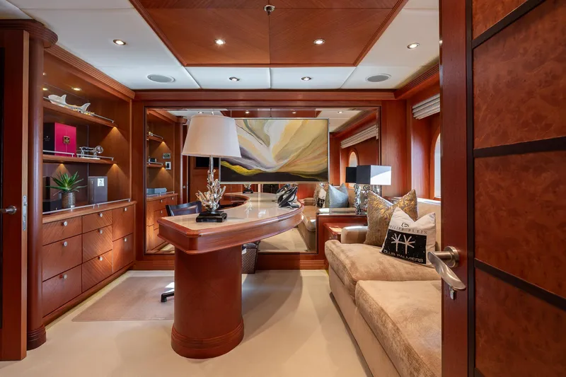 Skyfall Yacht Photos Pics Luxurious interior of 2010 Trinity Yachts motor yacht with elegant wood finishes and modern decor.