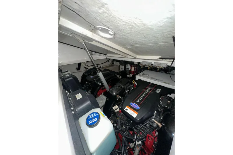 Just Traded Yacht Photos Pics Engine compartment of 2014 Regal 35 Sport Coupe with Volvo Penta engines.