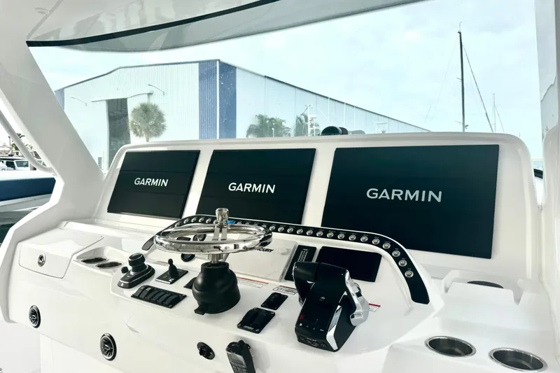  Yacht Photos Pics Helm of 2025 Intrepid 51 Panacea with Garmin displays and controls.