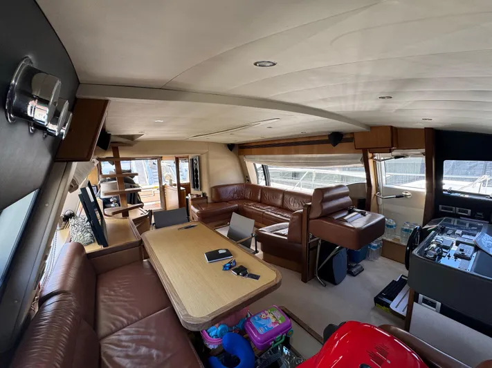  Yacht Photos Pics Luxurious interior of 2007 Ferretti Yachts 630 with leather seating and modern amenities.