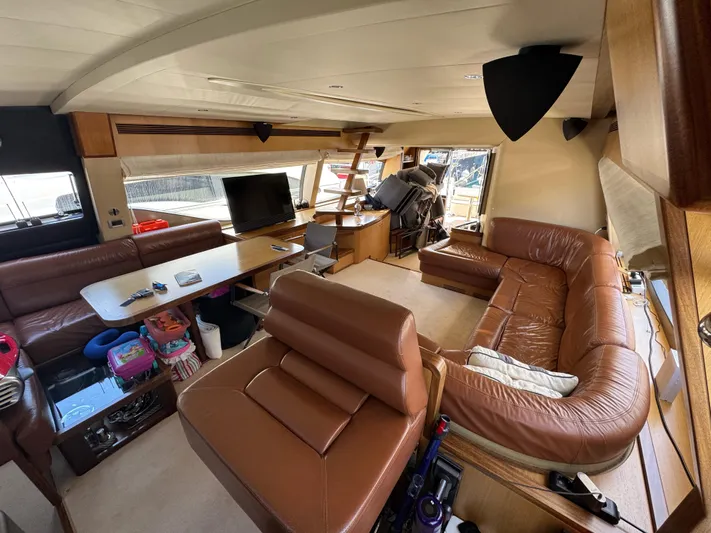  Yacht Photos Pics Luxurious interior of a 2007 Ferretti Yachts 630 with leather seating and modern amenities.