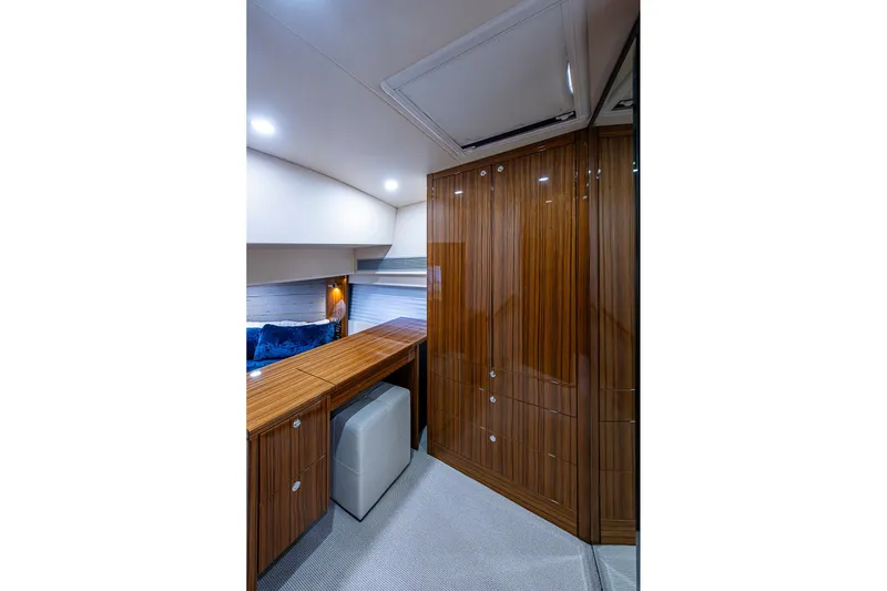 Tank Woo Yacht Photos Pics Luxurious interior of 2018 Maritimo M54 yacht with elegant wood cabinetry.
