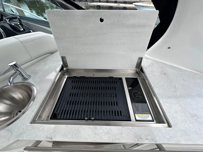 Sojourner Yacht Photos Pics 2024 Regal 33 XO boat grill and sink on deck.