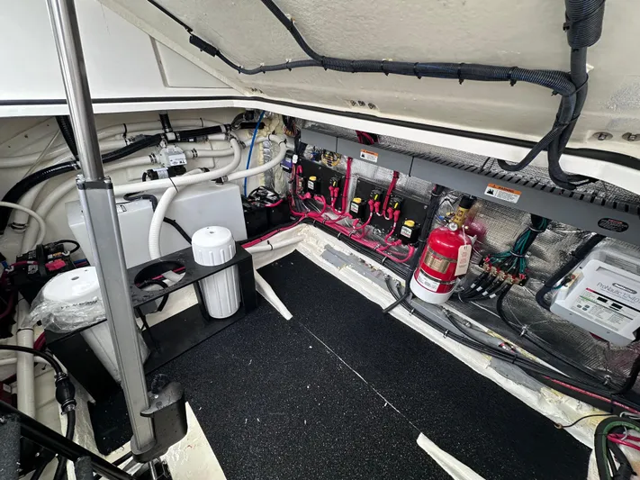 Sojourner Yacht Photos Pics Engine room of 2024 Regal 33 XO boat with wiring and equipment.