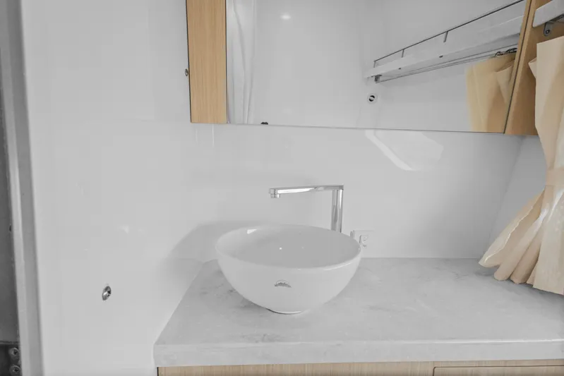 Sojourner Yacht Photos Pics 2024 Regal 33 XO boat bathroom with modern sink and faucet.