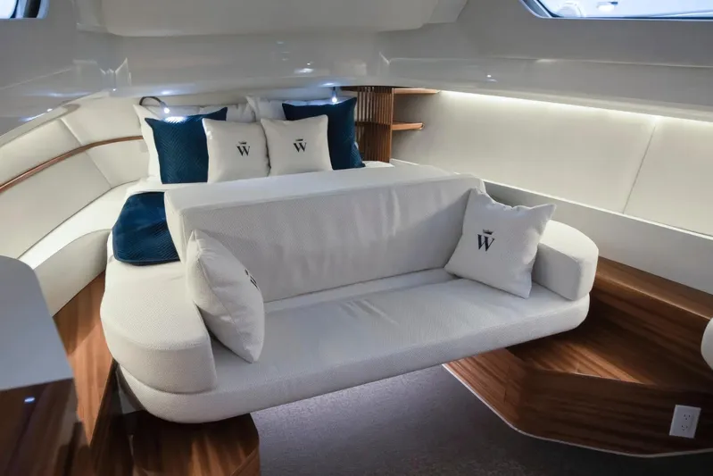  Yacht Photos Pics Luxurious interior of 2024 Wiszniewski Yachts W43, featuring elegant seating and stylish cushions.