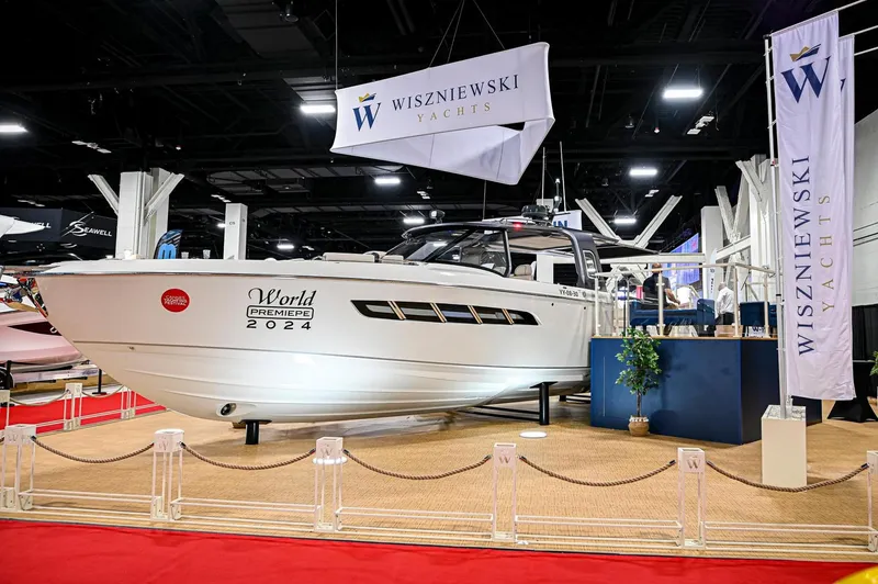  Yacht Photos Pics 2024 Wiszniewski Yachts W43 on display at a boat show, featuring sleek design and modern amenities.