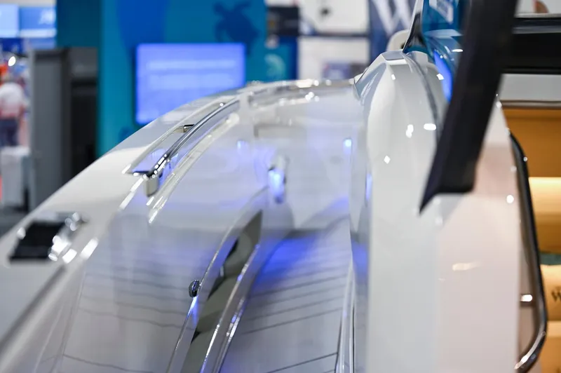  Yacht Photos Pics 2024 Wiszniewski Yachts W43, sleek design with blue LED lighting, showcased indoors.