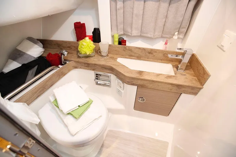  Yacht Photos Pics Manufacturer Provided Image: 2026 Formula 350 Crossover Bowrider I/O bathroom with modern sink and compact design.