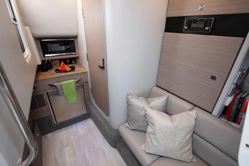  Yacht Photos Pics Manufacturer Provided Image: 2026 Formula 350 Crossover Bowrider I/O interior with kitchenette, seating, and modern amenities.