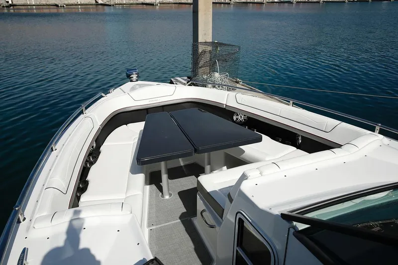  Yacht Photos Pics Manufacturer Provided Image: 2026 Formula 350 Crossover Bowrider I/O with spacious seating and table on calm water.