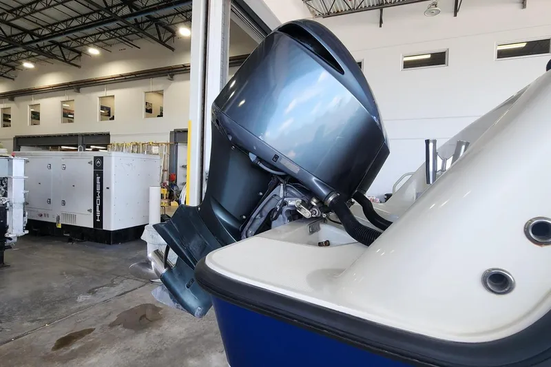  Yacht Photos Pics 2012 SeaVee 340B boat engine in a spacious indoor facility.